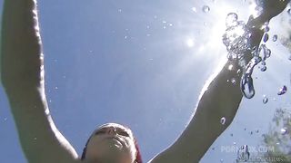 Busty redhead MILF Penny Pax has her pussy eaten by brunette beauty Belle Noire