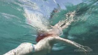 Busty redhead MILF Penny Pax has her pussy eaten by brunette beauty Belle Noire