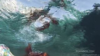 Busty redhead MILF Penny Pax has her pussy eaten by brunette beauty Belle Noire