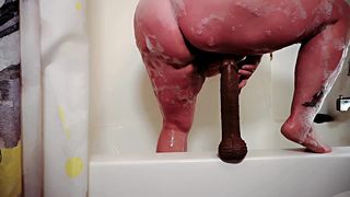 BATHTIME MASTURBATION WITH BBC DILDO