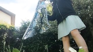 pee on the grass in a public park