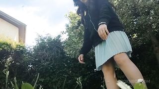 pee on the grass in a public park