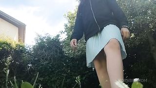 pee on the grass in a public park