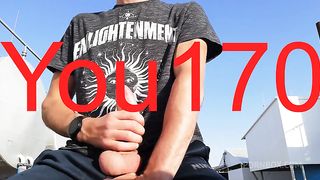 you want to watch this guy jerk off his big dick and bring himself to orgasm in a public place