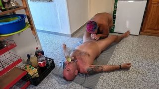 HUSBAND LYING ON HIS BACK DRINKING PISS & CUM THROUGH A FUNNEL