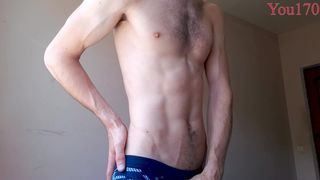 a guy with a beautiful body of an athlete jerks off his dick