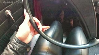 IN LEATHER DRIVING VW BEETLE