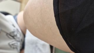 My friend gives me a pedicure in the shop