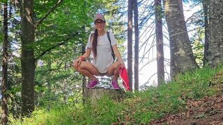SEXY HAIRY MILF PISSES ON THE FOREST PATH WHILE HIKING