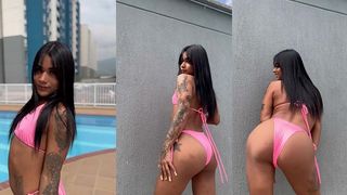 BY THE SWIMMING POOL