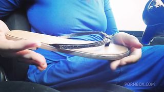 Adorable pedal pumping in flip flops and bare feet