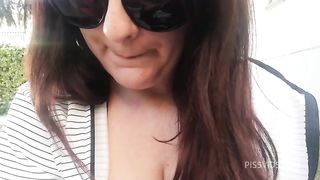 Completely dirty black yoga pants full of pee in public place