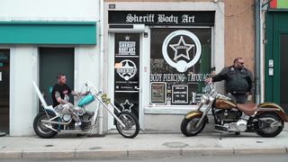Ania Kinski vs Mike Angelo in a tattoo shop
