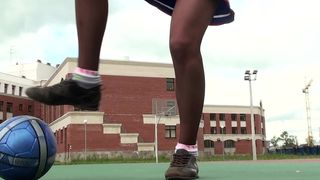 CUTE BLONDE IN CHEERLEADER UNIFORM AND PANTYHOSE AND NO PANTIES ON PLAYING WITH BALL IN PARK