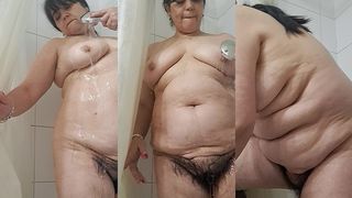 THE MILF IS TAKING A SHOWER TO GET RID OF THE HEAT.