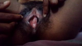 A BEWITCHING BEAUTIFUL MARRIED WOMAN THINKING WHILE PLAY ALONE