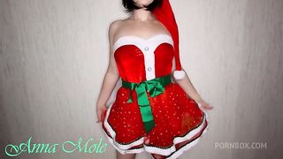 Sexy babe in Santa outfit wags her juicy ass and masturbates her juicy pussy