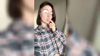 Your girlfriend with glasses fingering her wet pussy