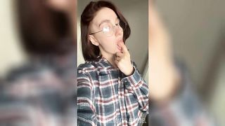 Your girlfriend with glasses fingering her wet pussy