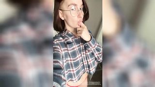 Your girlfriend with glasses fingering her wet pussy