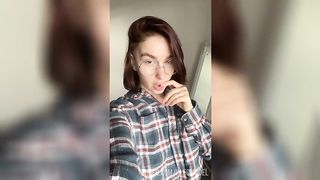 Your girlfriend with glasses fingering her wet pussy