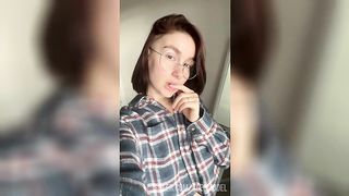 Your girlfriend with glasses fingering her wet pussy