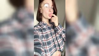 Your girlfriend with glasses fingering her wet pussy