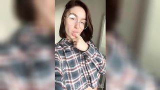 Your girlfriend with glasses fingering her wet pussy