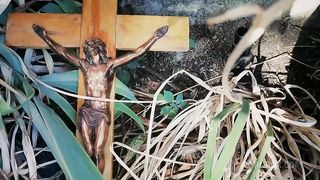 Italian slut pisses on a crucifix in a deconsecrated cemetery