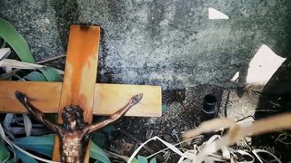 Italian slut pisses on a crucifix in a deconsecrated cemetery