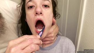 OLDER DOM BRUSHES YOUNG SUBS TEETH