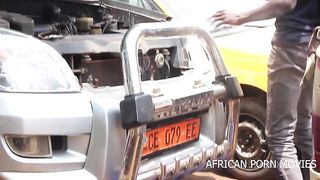 The mechanic and his customers caught fucking publicly in a garage of vehicles in front of the other customers with his big and long cock in his work clothes. exclusive to African street thug from Af