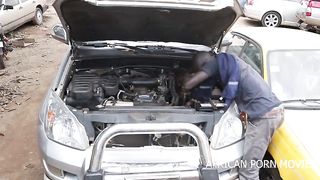 The mechanic and his client caught having sex publicly at the vehicle garage in front of the other clients in the hot sun with his big and long cock in public on Formens