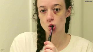 BLACK EYE TOOTH BRUSHING IN BRAIDS