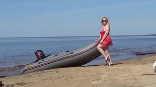 MILF IN RED ON THE BEACH