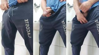 A WELL-ENDOWED BRAZILIAN MAN URINATING AND SHOWING OFF HIS LARGE, THICK PENIS.