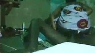 A VILLAGE UNIVERSITY STUDENTS WITH HER LECTURE