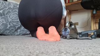 Italian housewife vacuums carpet