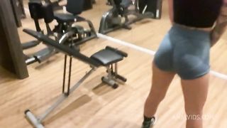Naughty redhead was surprised at the gym by her friend and fell head over heels before being fucked