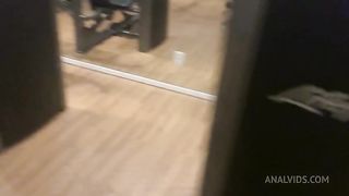 Naughty redhead was surprised at the gym by her friend and fell head over heels before being fucked