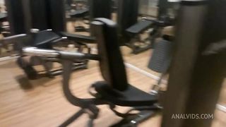 Naughty redhead was surprised at the gym by her friend and fell head over heels before being fucked
