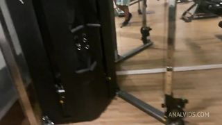 Naughty redhead was surprised at the gym by her friend and fell head over heels before being fucked