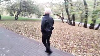 A mature woman with a camera walks about the park, and no one even guesses that she is a famous whore .!. ))