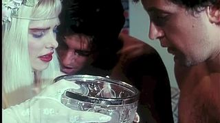 Vintage scenes with Rocco Siffredi and Cicciolina in an orgy where she make drink her piss
