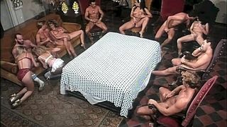 Vintage orgy around the table with Moana Pozzi, Barbarella and Rocco Siffredi