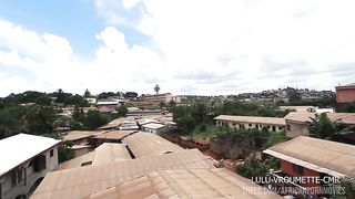 The seamstress with her client in the Sewing workshop whos to take the measurements of pants to take the measurements of the cock in public