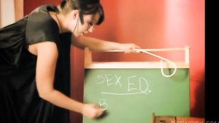 Busty blonde moans while naughty brunette shoves a toy in her cunt