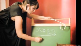 Busty blonde moans while naughty brunette shoves a toy in her cunt