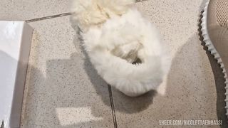 In the shoe shop we try on all the slippers