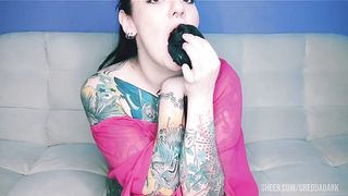 Tattooed hottie with a big ass takes her panties in her mouth and slaps her fucking ass